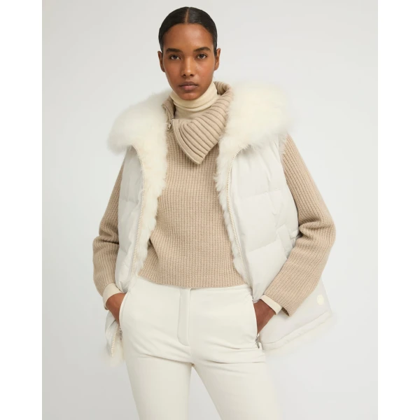 Woman wearing Yves Salomon shearling fur coat – luxury outerwear at Coveti