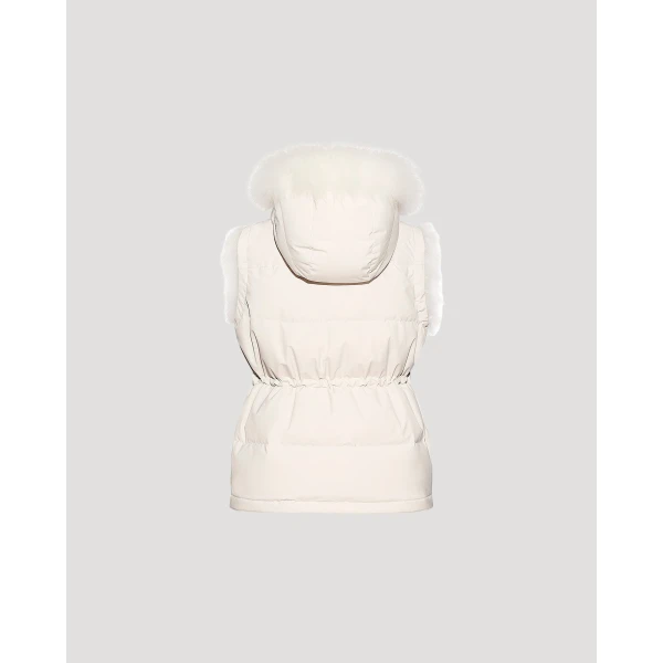 Woman wearing Yves Salomon shearling fur coat – luxury outerwear at Coveti