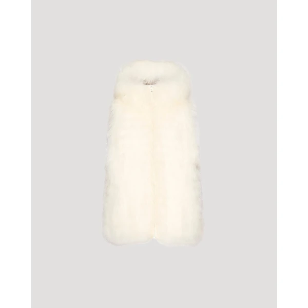 Woman wearing Yves Salomon shearling fur coat – luxury outerwear at Coveti