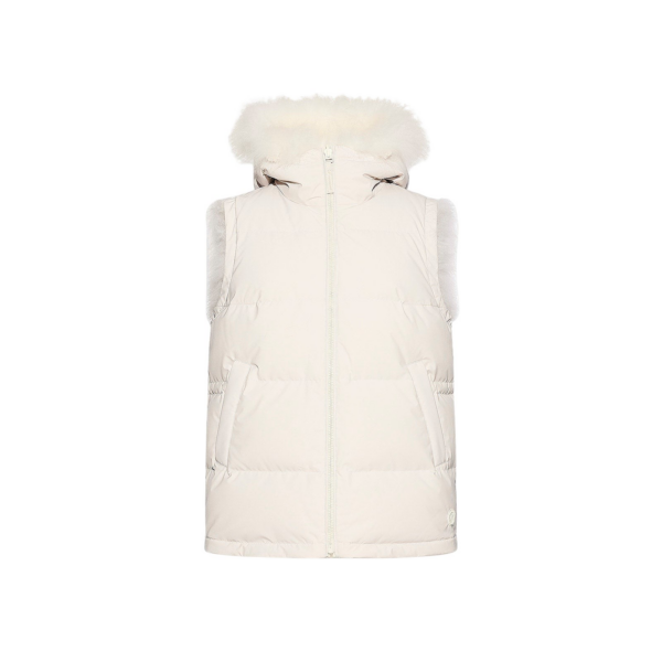 Woman wearing Yves Salomon shearling fur coat – luxury outerwear at Coveti