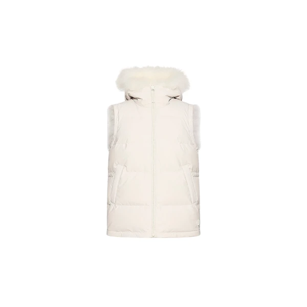 Woman wearing Yves Salomon shearling fur coat – luxury outerwear at Coveti