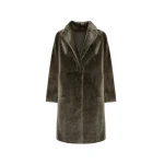 Woman wearing Yves Salomon shearling fur coat – luxury outerwear at Coveti