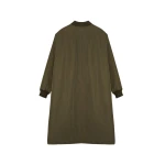 Woman wearing Yves Salomon shearling fur coat – luxury outerwear at Coveti