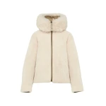 Woman wearing Yves Salomon shearling fur coat – luxury outerwear at Coveti