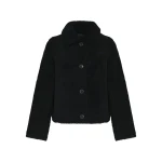 Woman wearing Yves Salomon shearling fur coat – luxury outerwear at Coveti