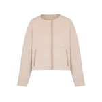 Woman wearing Yves Salomon shearling fur coat – luxury outerwear at Coveti
