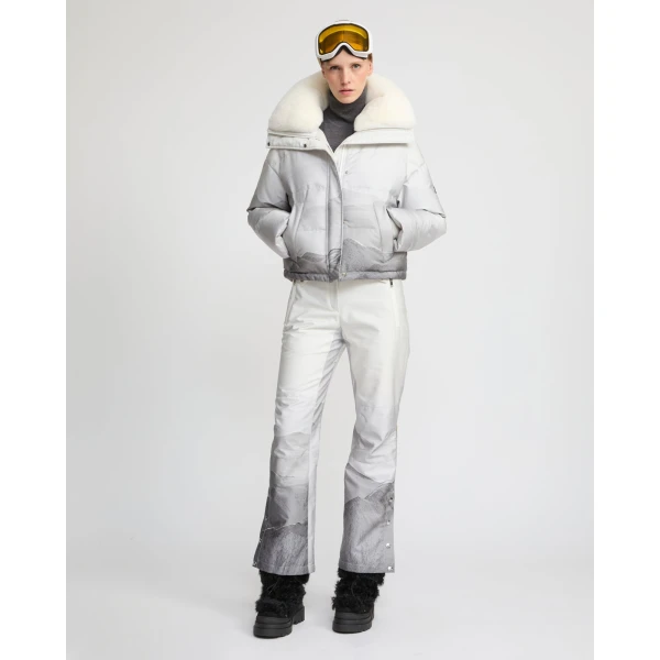 Woman wearing Yves Salomon shearling fur coat – luxury outerwear at Coveti