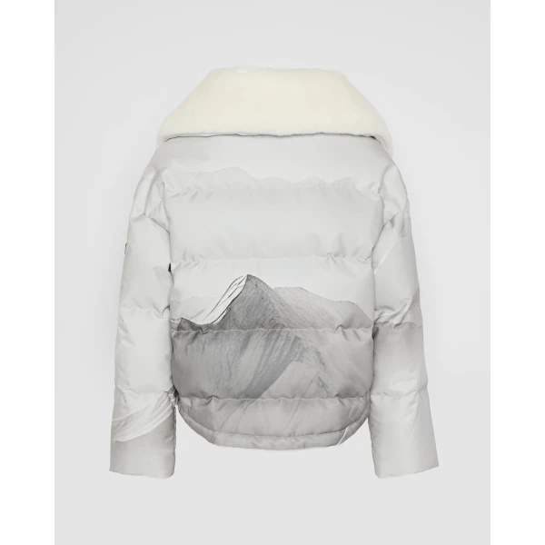 Woman wearing Yves Salomon shearling fur coat – luxury outerwear at Coveti