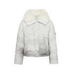 Woman wearing Yves Salomon shearling fur coat – luxury outerwear at Coveti