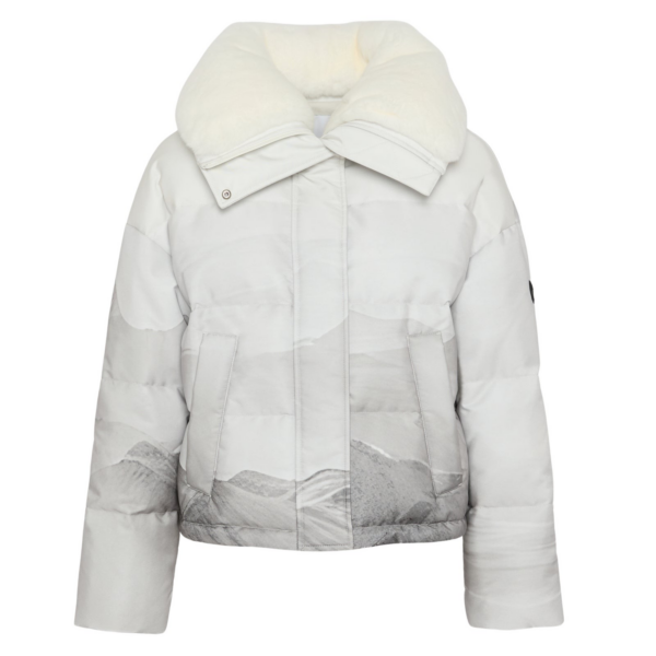 Woman wearing Yves Salomon shearling fur coat – luxury outerwear at Coveti