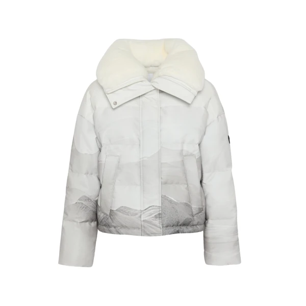 Woman wearing Yves Salomon shearling fur coat – luxury outerwear at Coveti