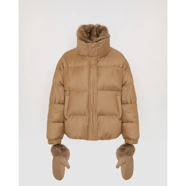 Woman wearing Yves Salomon shearling fur coat – luxury outerwear at Coveti