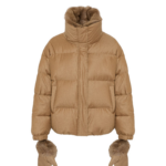 Woman wearing Yves Salomon shearling fur coat – luxury outerwear at Coveti