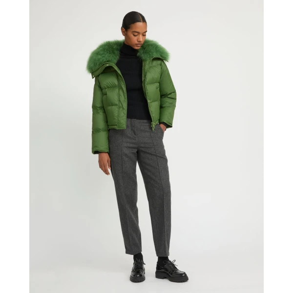 Woman wearing Yves Salomon shearling fur coat – luxury outerwear at Coveti