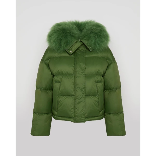 Woman wearing Yves Salomon shearling fur coat – luxury outerwear at Coveti