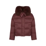 Woman wearing Yves Salomon shearling fur coat – luxury outerwear at Coveti