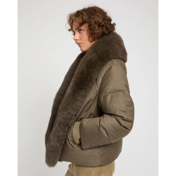 Woman wearing Yves Salomon shearling fur coat – luxury outerwear at Coveti