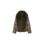 Woman wearing Yves Salomon shearling fur coat – luxury outerwear at Coveti