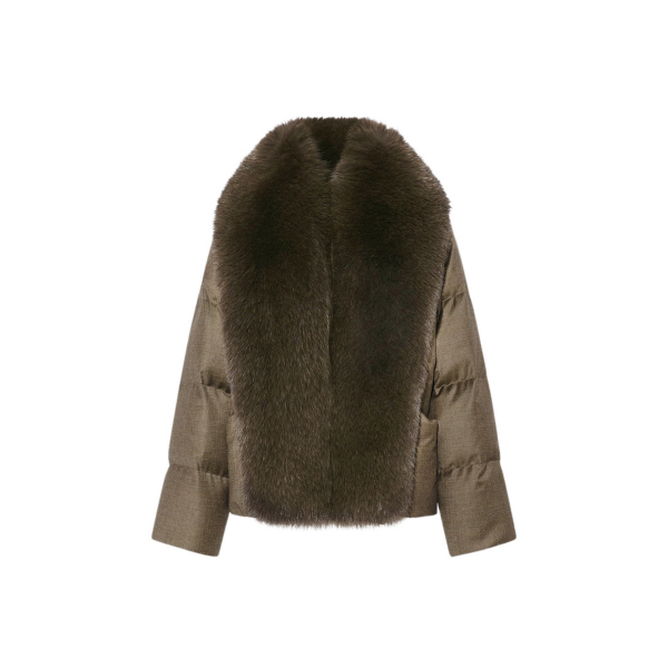 Woman wearing Yves Salomon shearling fur coat – luxury outerwear at Coveti
