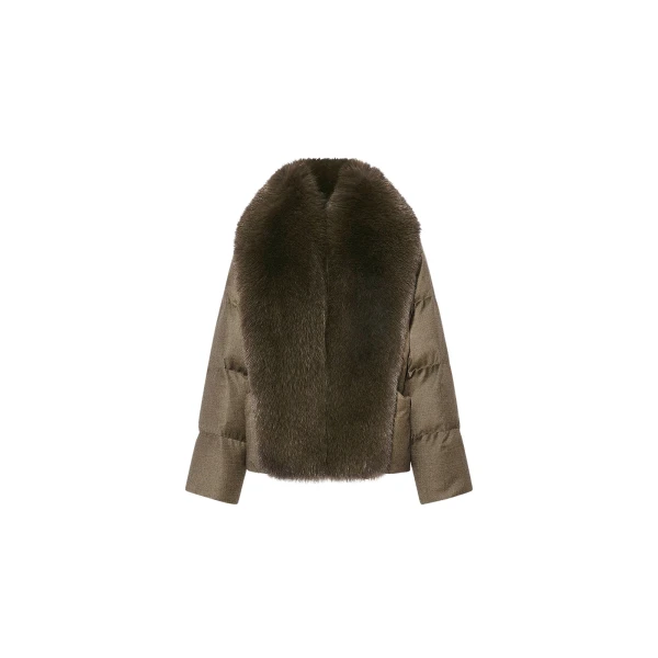 Woman wearing Yves Salomon shearling fur coat – luxury outerwear at Coveti