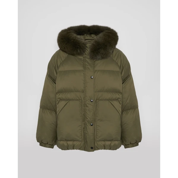 Woman wearing Yves Salomon shearling fur coat – luxury outerwear at Coveti