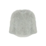 Woman wearing Yves Salomon shearling fur coat – luxury outerwear at Coveti