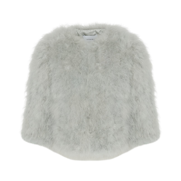 Woman wearing Yves Salomon shearling fur coat – luxury outerwear at Coveti