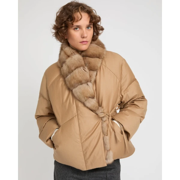 Woman wearing Yves Salomon shearling fur coat – luxury outerwear at Coveti