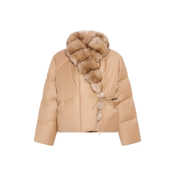 Woman wearing Yves Salomon shearling fur coat – luxury outerwear at Coveti