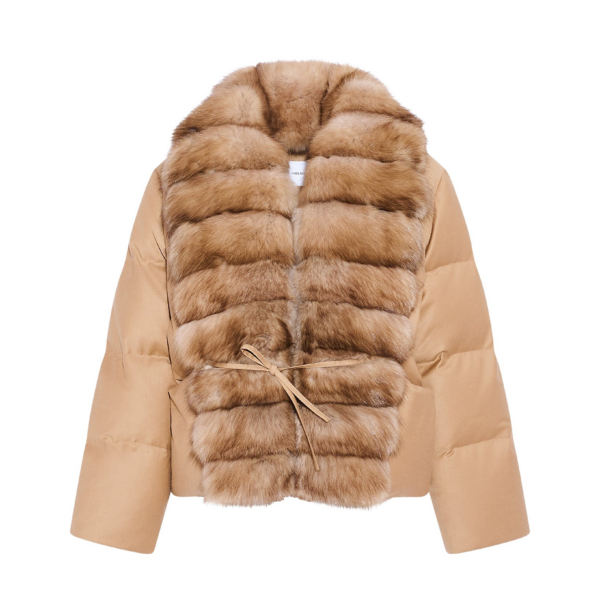 Woman wearing Yves Salomon shearling fur coat – luxury outerwear at Coveti