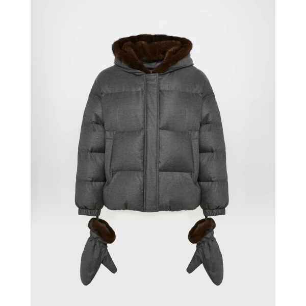 Woman wearing Yves Salomon shearling fur coat – luxury outerwear at Coveti