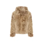 Woman wearing Yves Salomon shearling fur coat – luxury outerwear at Coveti