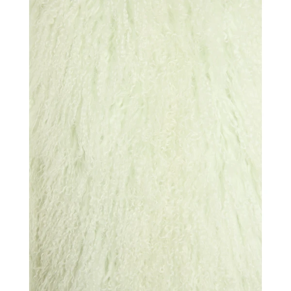 Woman wearing Yves Salomon shearling fur coat – luxury outerwear at Coveti