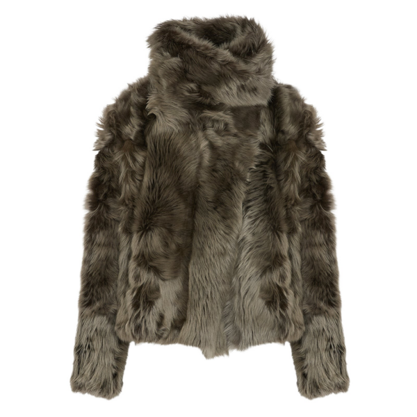 Woman wearing Yves Salomon shearling fur coat – luxury outerwear at Coveti