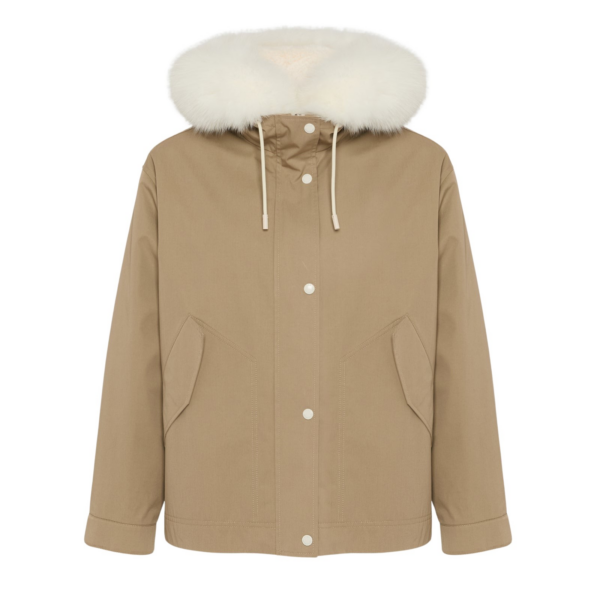 Woman wearing Yves Salomon shearling fur coat – luxury outerwear at Coveti