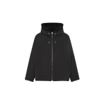 Woman wearing Yves Salomon shearling fur coat – luxury outerwear at Coveti