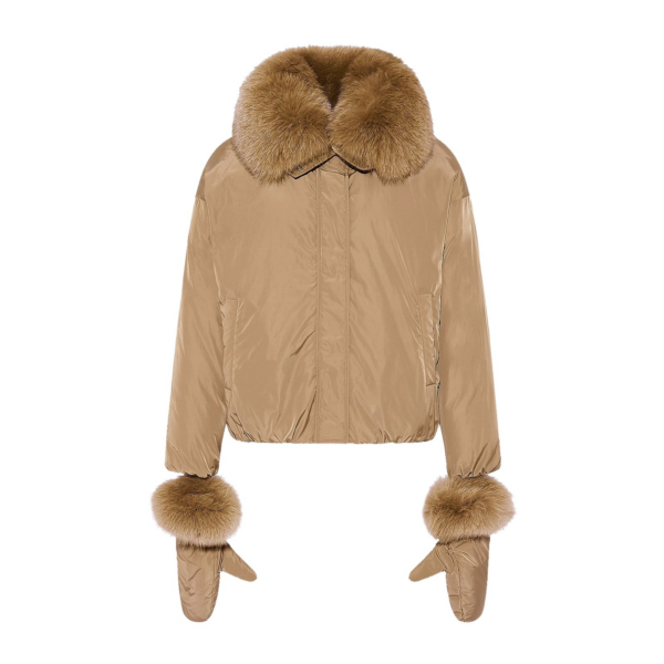 Woman wearing Yves Salomon shearling fur coat – luxury outerwear at Coveti