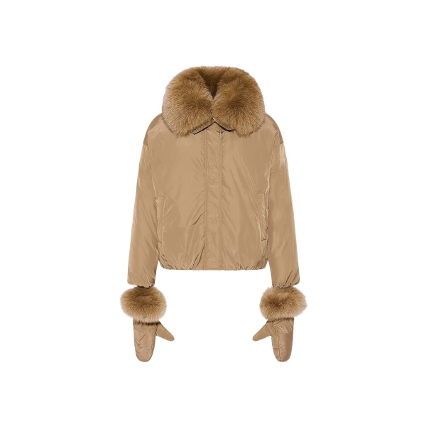 Woman wearing Yves Salomon shearling fur coat – luxury outerwear at Coveti