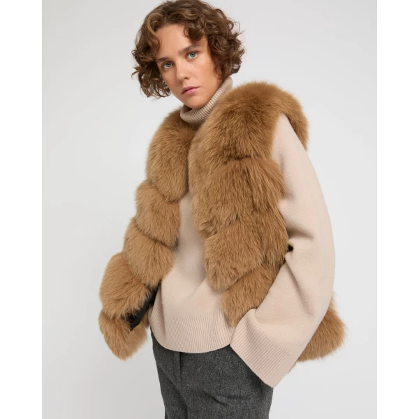 Woman wearing Yves Salomon shearling fur coat – luxury outerwear at Coveti