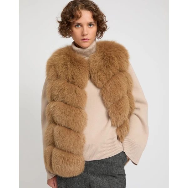 Woman wearing Yves Salomon shearling fur coat – luxury outerwear at Coveti