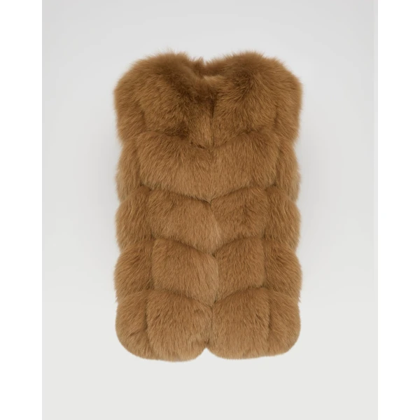 Woman wearing Yves Salomon shearling fur coat – luxury outerwear at Coveti