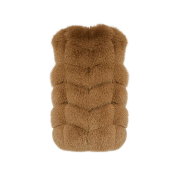 Woman wearing Yves Salomon shearling fur coat – luxury outerwear at Coveti