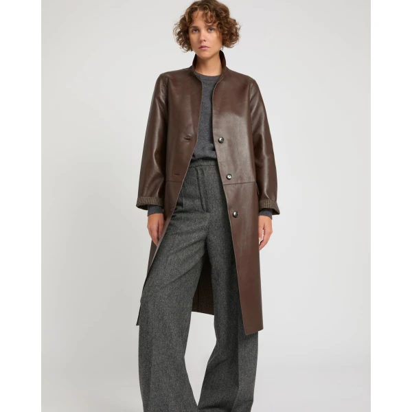 Woman wearing Yves Salomon shearling fur coat – luxury outerwear at Coveti