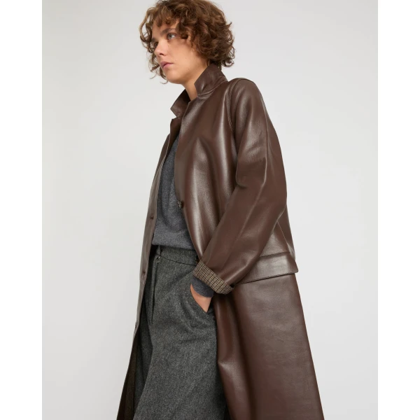 Woman wearing Yves Salomon shearling fur coat – luxury outerwear at Coveti