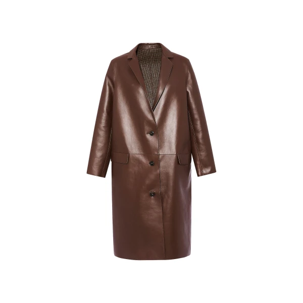 Woman wearing Yves Salomon shearling fur coat – luxury outerwear at Coveti