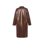 Woman wearing Yves Salomon shearling fur coat – luxury outerwear at Coveti