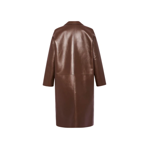 Woman wearing Yves Salomon shearling fur coat – luxury outerwear at Coveti