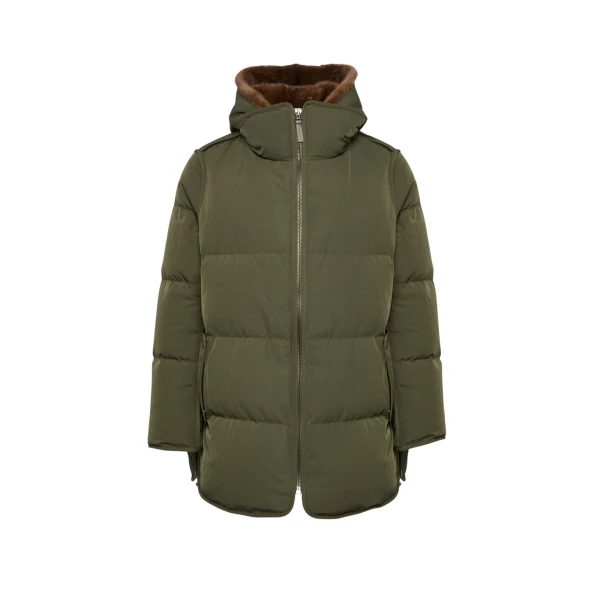 Woman wearing Yves Salomon shearling fur coat – luxury outerwear at Coveti