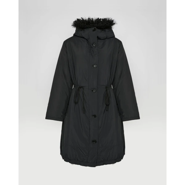 Woman wearing Yves Salomon shearling fur coat – luxury outerwear at Coveti