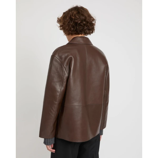 Woman wearing Yves Salomon shearling fur coat – luxury outerwear at Coveti